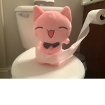 Kitty cat on a toilet.