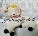 grotesque doll