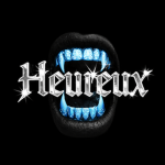 ' Heuréux