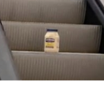 Manly mayonnaise on a escalator