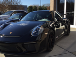 Moon’s Porsche dealership