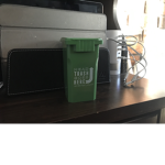 Raccoon go through trash