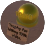 You played during the 100k visits event and obtained the 100k visits trophy.