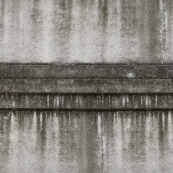 dirty concrete retaining wall
