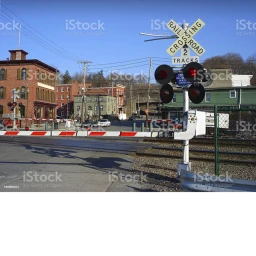 small city railroad crossing icon