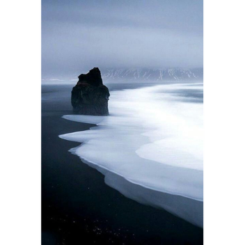 house w/ black beach