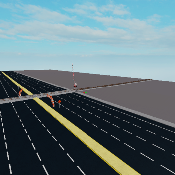 BIG ROAD WITH RAILROAD CROSSING