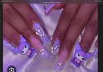 These are my Kuromi nails in irl i told my friend