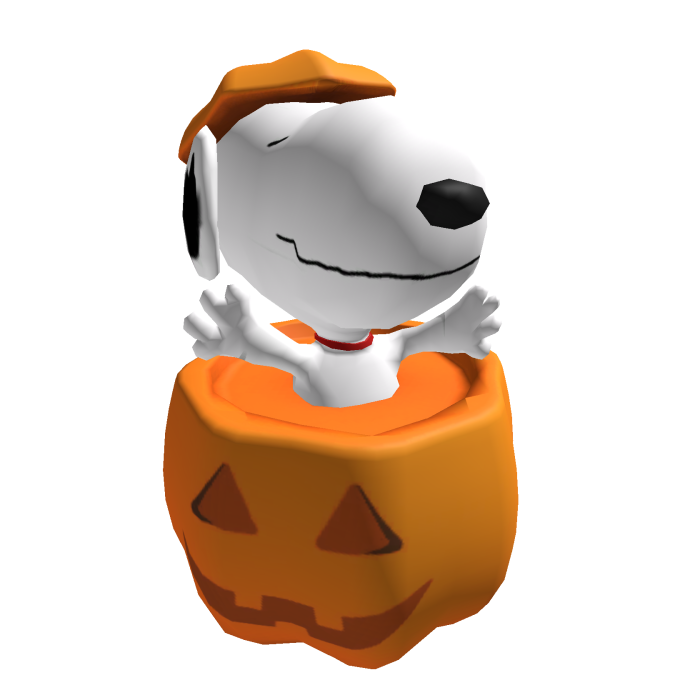 Cute White Puppy in a Pumpkin  