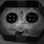 a dolls button eye