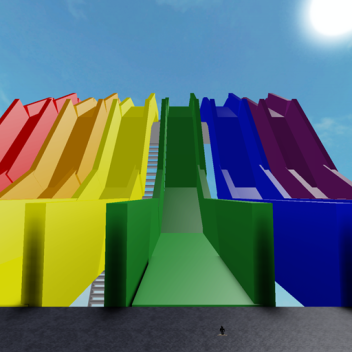 Ride down a rainbow slide to meet Batman!