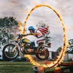 Jump motorbike through flame ring