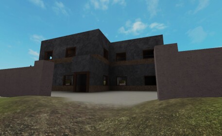 A simple stone house built in Roblox