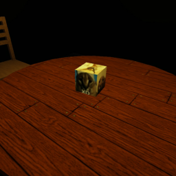 In a dark room with a spinning cube.