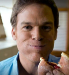 dexter eating a donut