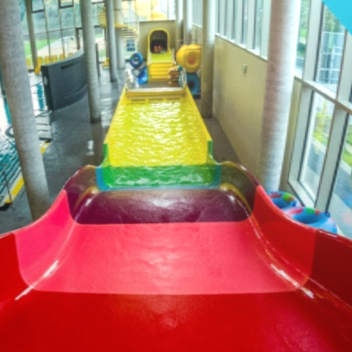 ride a car down a rainbow slide